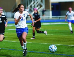 Olivia Huber on the soccer field, intense and competitive describe her approach to sports. Photo by Joe Humphries