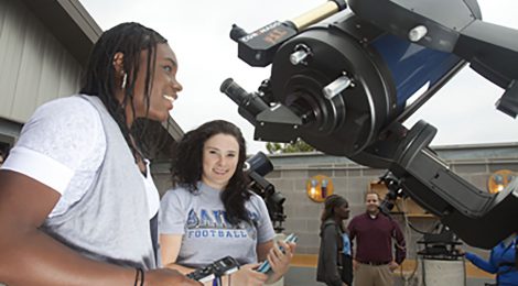 Students studying the sky at TMU's observatory