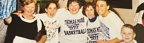 Professor Judy Harris, Shannon Galbraith-Kent, Dr. Ann Hicks, Dr. Maria McLean, Amy Burk, and John Wehry on Senior Day at the Thomas More women's basketball game.