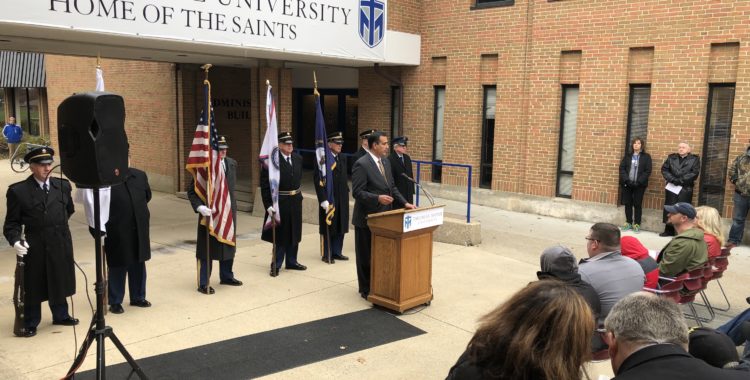 Man speaking at podium