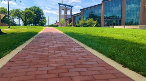 brick pathway leading to chapel